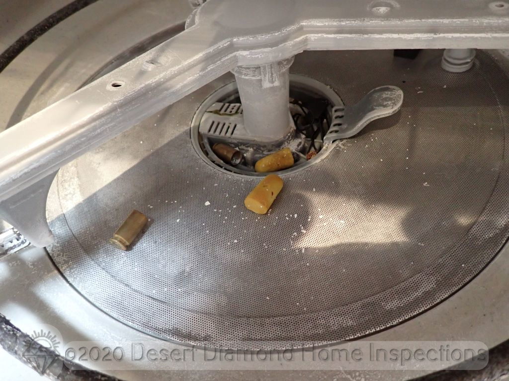 Discovered in a dishwasher: ammo casings and ear plugs