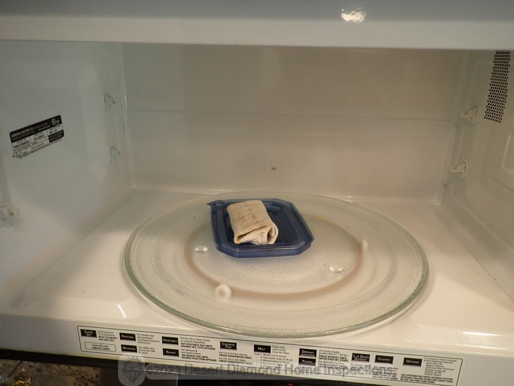 Opened the microwave to test it in this vacant home I was inspecting, and found this petrified abandoned burrito. Thanks, but I brought my own snack...