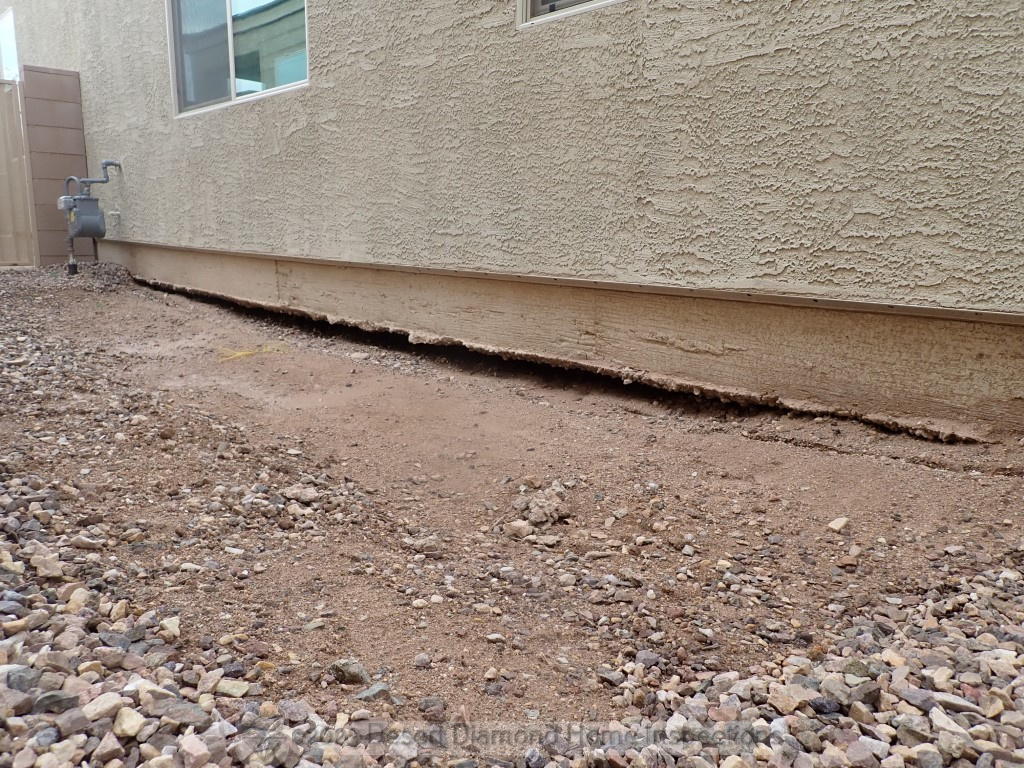 Bad grading/drainage leads to erosion, which led to this gaping void under the foundation of this home!