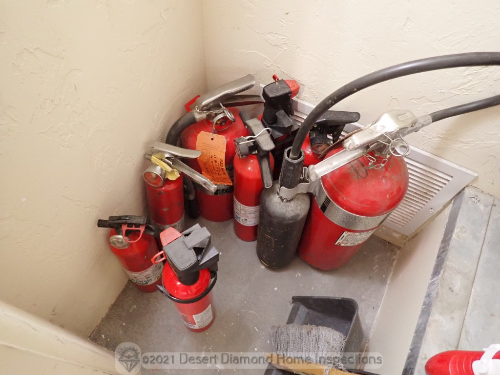 Fire extinguishers hidden in garage