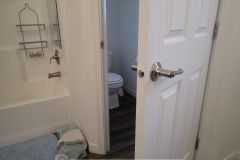 There is something wrong with the lock on this bathroom door. Can you tell what? 