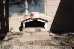 Now that's a cool doggy door! And it matches the style of the house, too