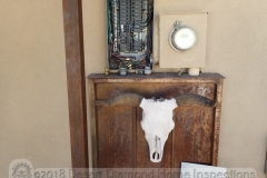 Home inspections can be dangerous. There is a good chance you could get gored while inspecting the electrical panel.
