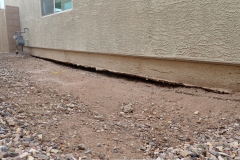 Bad grading/drainage leads to erosion, which led to this gaping void under the foundation of this home!