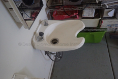 Hair salon shampoo sink in garage