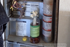 Nope, just a bottle of Pine-Sol with a wick in it stuck in the HVAC system of a manufactured home as a futile attempt to mask the smell of cigarette smoke in the house.