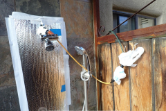 Extension cord at shower head? Why?