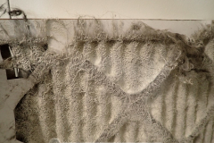 Close-up of filthy paint sealed air filter